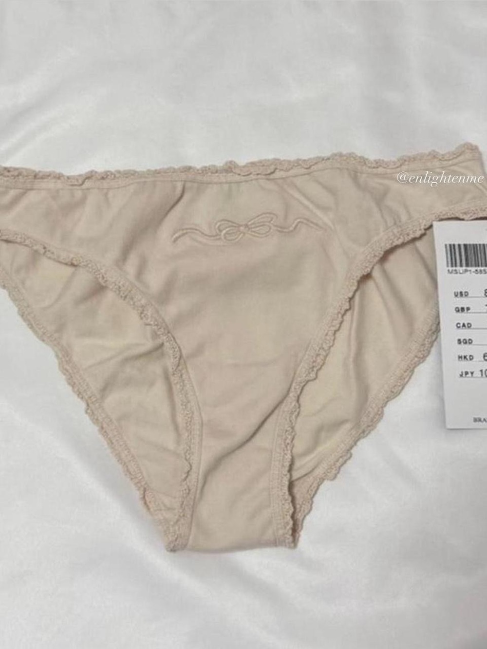 Brandy Melville peach pink underwear with bow ribbon graphic and scallop hem